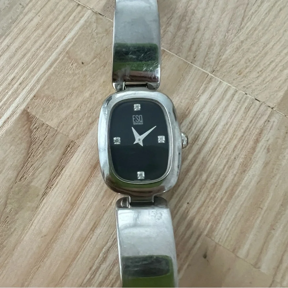 Esq by Movado ladies black dial silver tone dress watch NEW BATTERY